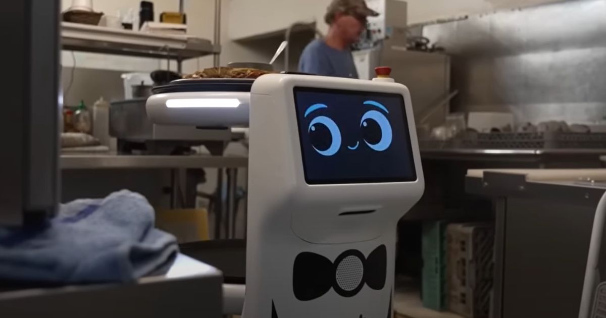A robot server, Plato, transports and serves food to patrons at The Cazadero restaurant in Estacada, Oregon.