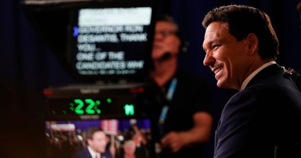 Florida Gov. Ron DeSantis listens during an interview in the spin room after the Republican presidential primary debate hosted by FOX News Channel on Wednesday in Milwaukee, Wisconsin.