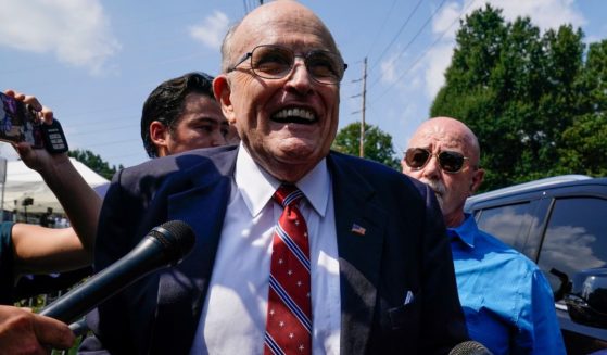 Rudy Giuliani speaks outside the Fulton County jail
