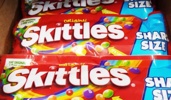 Packages of Skittles candies are on display in a Walgreens in Los Angeles, California, on May 30.