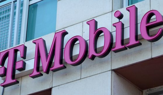A T-Mobile sign hangs outside of a store in Miami, Florida, on Feb. 1.