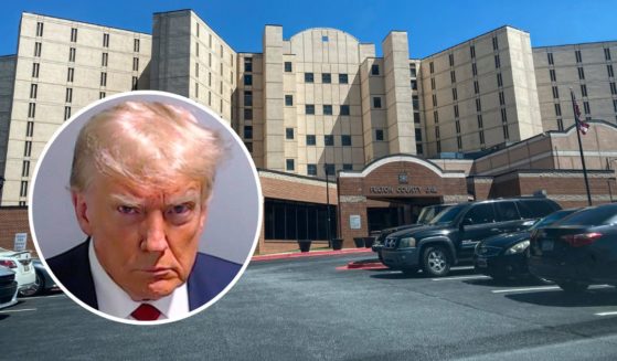 Former President Donald Trump, inset, was booked at the Fulton County Jail in Atlanta on Thursday.