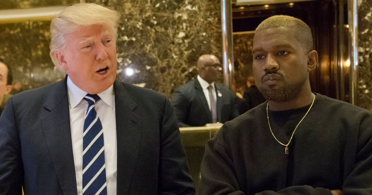 Then-President-elect Donald Trump, left, and Kanye West, right, pose for a picture in the lobby of Trump Tower in New York City on Dec. 13, 2016.