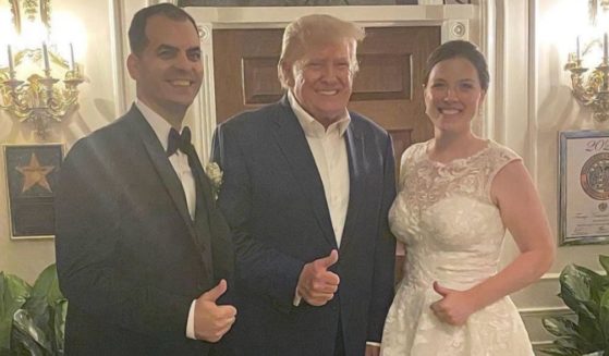 Former President Donald Trump "crashed" a wedding party at his Bedminster, New Jersey, golf club Thursday.