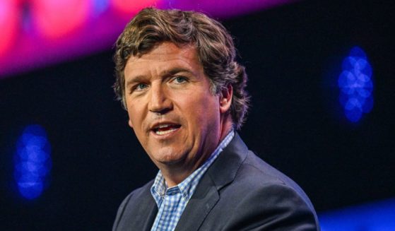Tucker Carlson speaks at the Turning Point Action USA conference in West Palm Beach, Florida, on July 15. Recently, Carlson warned that the country is coming close to the assassination of former President Donald Trump.