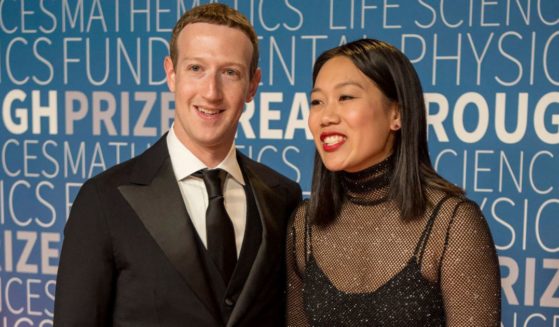 Meta CEO Mark Zuckerberg and his wife, Priscilla Chan, arrive at the seventh annual Breakthrough Prize science ceremony at the NASA Ames Research Center in 2018 in Mountain View, California.