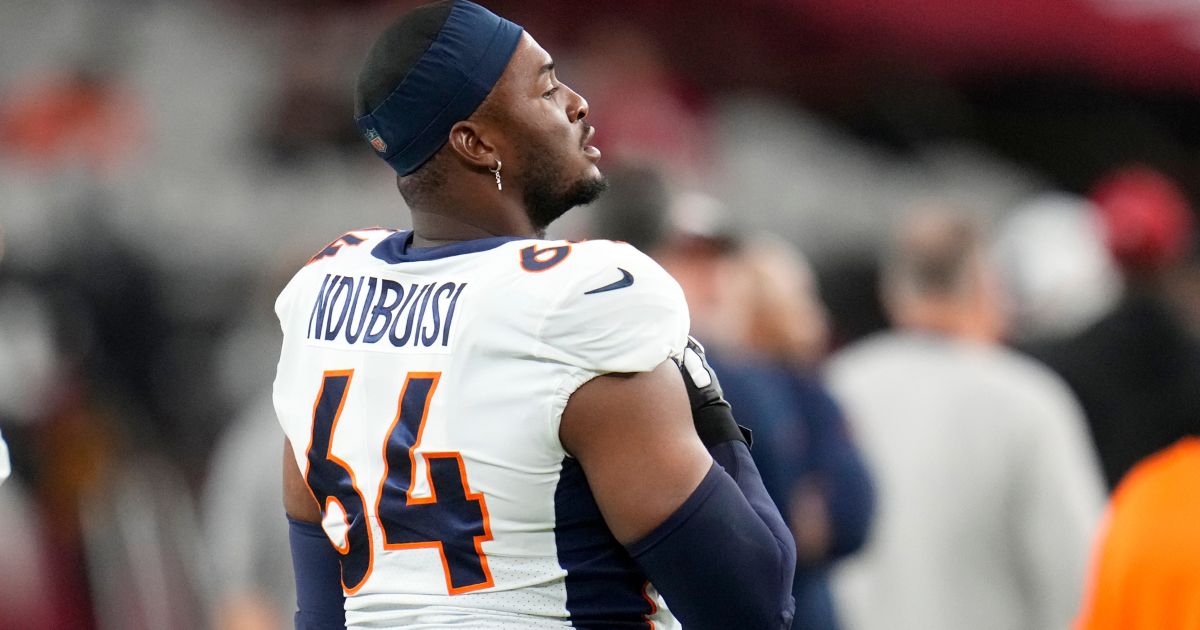 Denver Broncos defensive lineman Haggai Ndubuisi pauses on the field before an NFL preseason game against the Arizona Cardinals last Friday in Glendale, Arizona.
