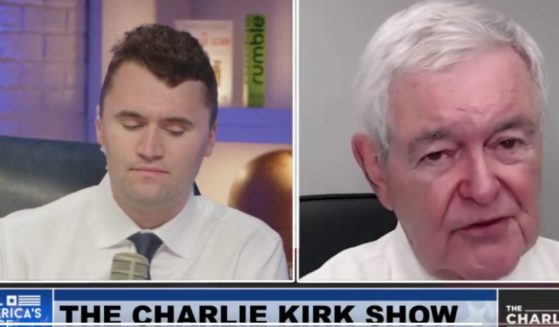 Newt Gingrich, former Speaker of the House, talks Thursday with radio host Charlie Kirk, left, on "The Charlie Kirk Show."