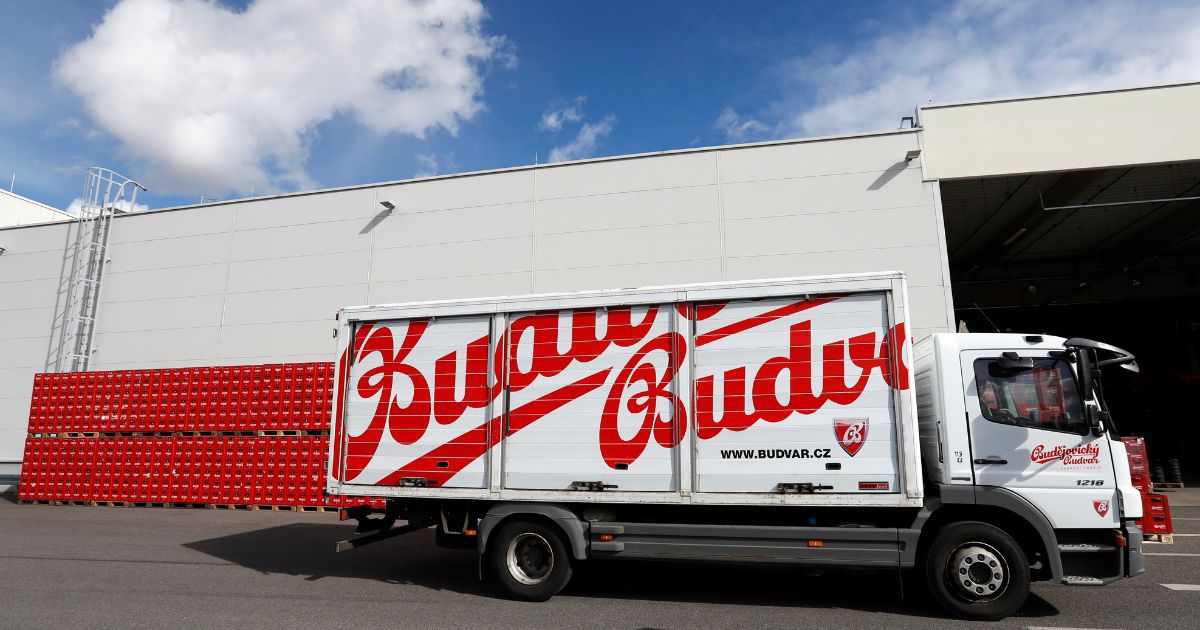 A truck drives past cases of Budweiser beer at the Budejovicky Budvar brewery in the Czech Republic, on March 11, 2019.