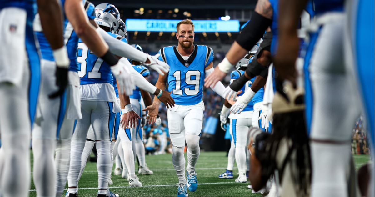 The Carolina Panthers' Adam Thielen runs onto the field Friday before the Panthers preseason game against the Detroit Lions in Charlotte, North Carolina.