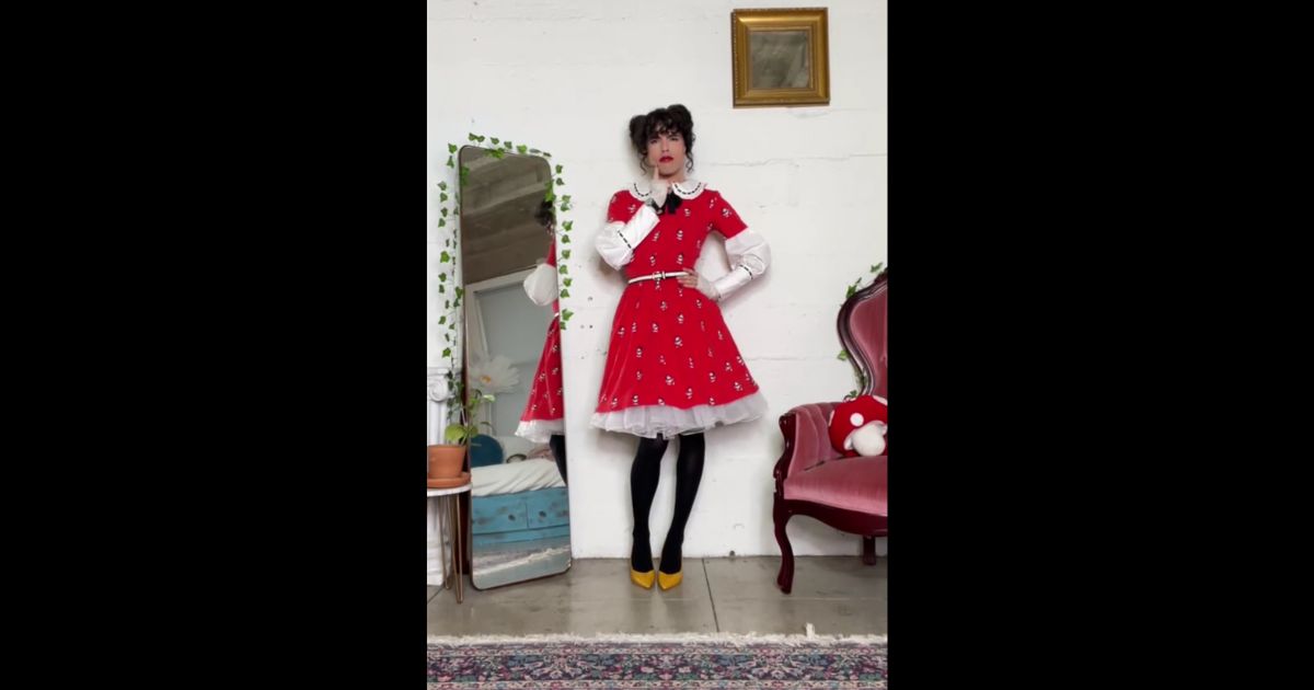 This TikTok screen shot shows gender-fluid influencer Seann Altman posing in Disney clothes.