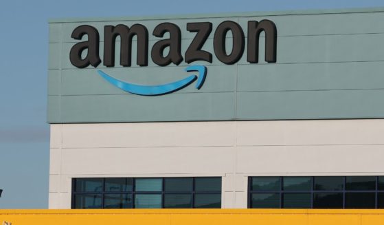 The Amazon logo is displayed outside the Amazon UK Services Ltd Warehouse on Dec. 7, 2022, in Warrington, England.