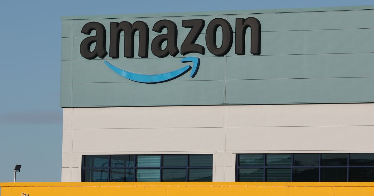 The Amazon logo is displayed outside the Amazon UK Services Ltd Warehouse on Dec. 7, 2022, in Warrington, England.