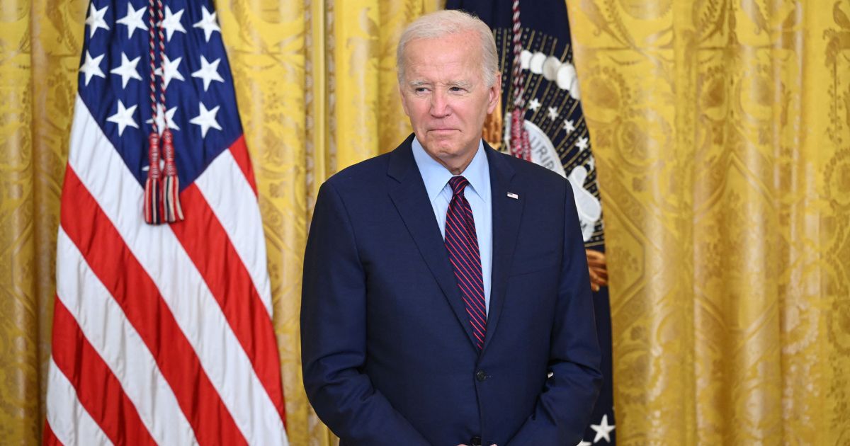 President Joe Biden hosts a reception to commemorate the 60th Anniversary of the founding of the Lawyers' Committee for Civil Rights Under Law, in the East Room of the White House in Washington, D.C., on Monday.