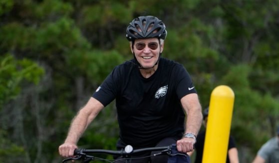 President Joe Biden goes on a bike ride in Gordons Pond State Park in Rehoboth Beach, Delaware, on Monday.