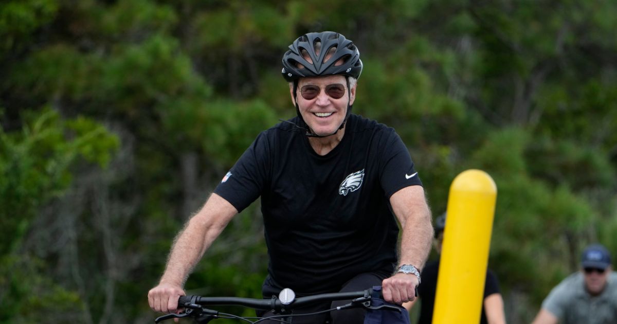 President Joe Biden goes on a bike ride in Gordons Pond State Park in Rehoboth Beach, Delaware, on Monday.