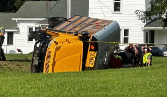 A local journalist shared this image of an Ohio school bus turned over.