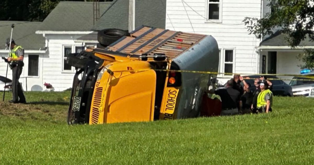 A local journalist shared this image of an Ohio school bus turned over.