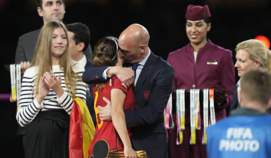 Luis Rubiales hugs Spain's Aitana Bonmati