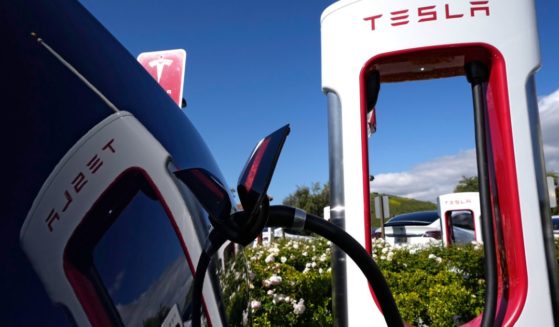 a Tesla electric vehicle charging