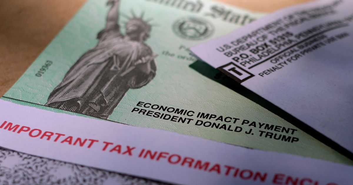 President Donald J. Trump's name is printed on a stimulus check issued by the IRS to help combat the adverse economic effects of the COVID-19 outbreak in this April 23, 2020, photo taken in San Antonio.
