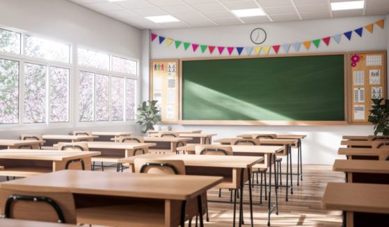 The above stock image is of a classroom.
