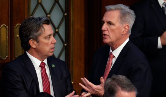 U.S. House Republican Leader Kevin McCarthy talks to Rep.-elect Andy Ogles (R-TN) in the House Chamber during the third day of elections for Speaker of the House at the U.S. Capitol Building on Jan. 5 in Washington, D.C.