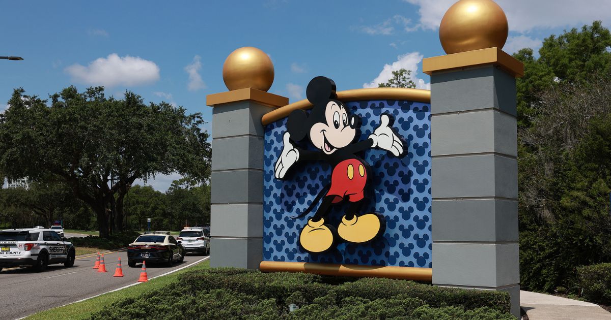 A sign near an entranceway to Walt Disney World on May 22 in Orlando, Florida.
