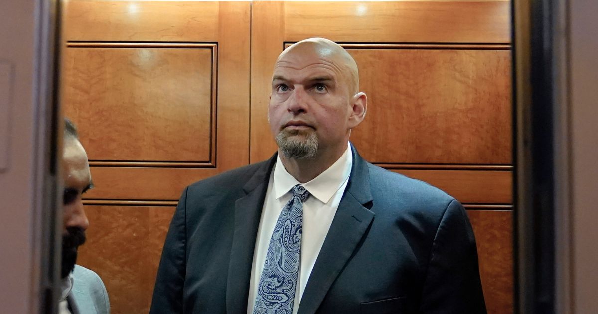 Democratic Sen. John Fetterman walks off an elevator, on June 13, on Capitol Hill in Washington, D.C. The Pennsylvanian was recently called out for making fun of a woman’s mental breakdown.