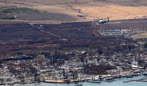 Marine One, carrying President Joe Biden, flies above wildfire damage in Lahaina on the island of Maui, in Hawaii on Aug. 21.