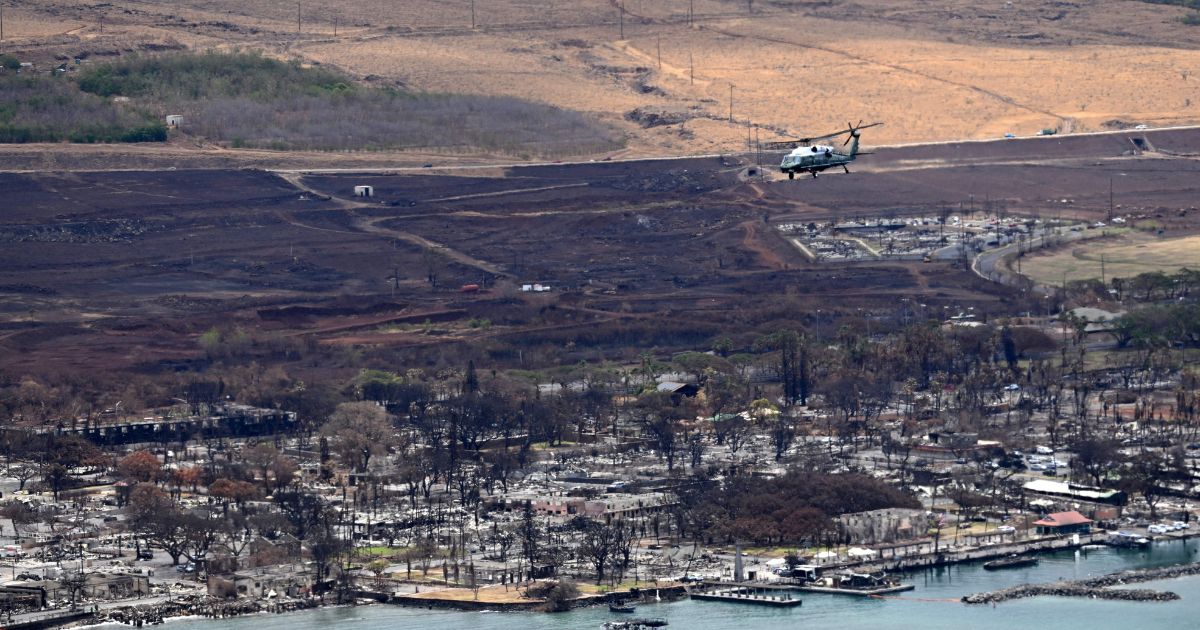 Marine One, carrying President Joe Biden, flies above wildfire damage in Lahaina on the island of Maui, in Hawaii on Aug. 21.