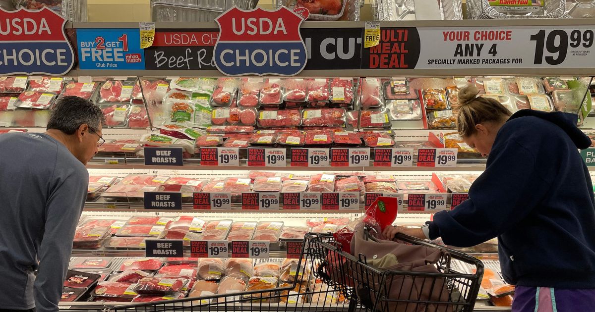 Consumers shop for meat at a Safeway grocery store in Annapolis, Maryland, on May 16, 2022, as Americans brace for summer sticker shock as inflation continues to grow.