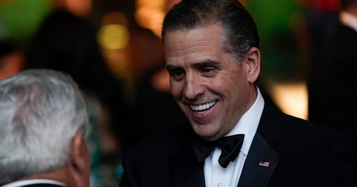 A smiling Hunter Biden is pictured in a June 22 file photo attending a state dinner at the White House.