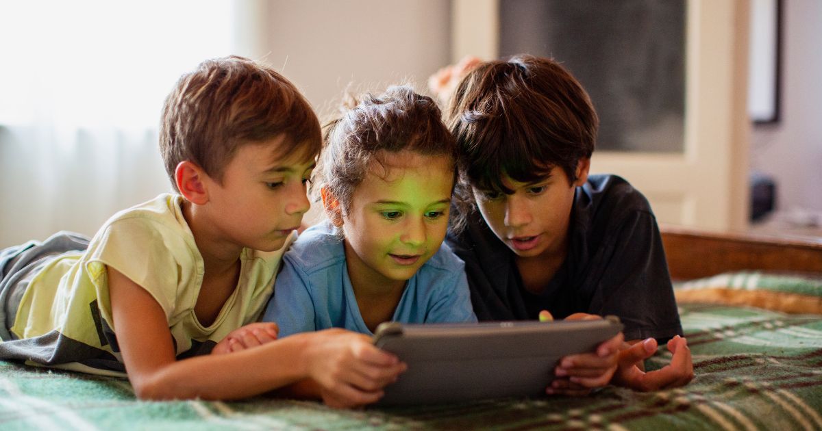 Nowadays, kids like the ones pictured have easy access to the internet, which has more negatives than positives. Recently, the Biden administration cut funding for a task force dedicated to protecting kids on the web.