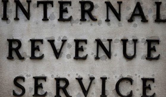 A small sign indicates the headquarters of the Internal Revenue Service on April 7, 2023 in Washington, DC.