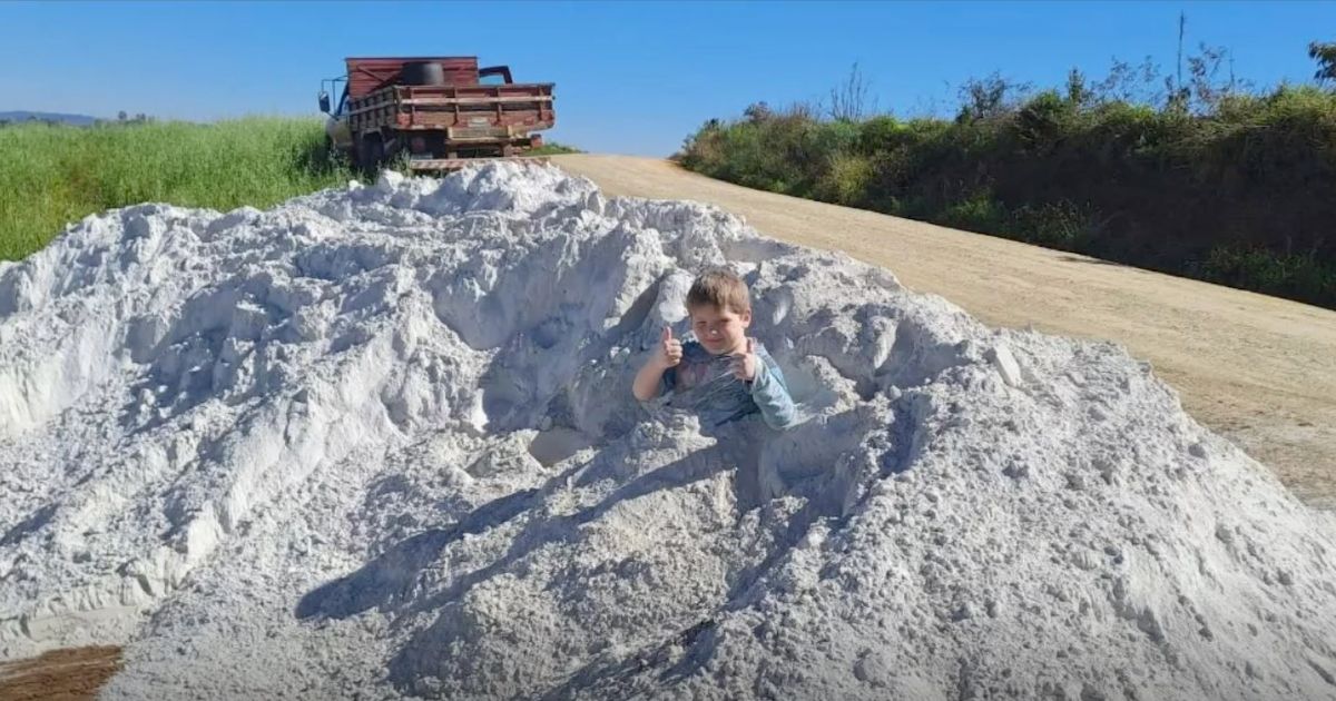 In a Facebook post, 7-year-old Arthur Emanuel Bitencourt was seen playing in a pile of limestone just minutes before his tragic death, which was caused by inhaling too much limestone.