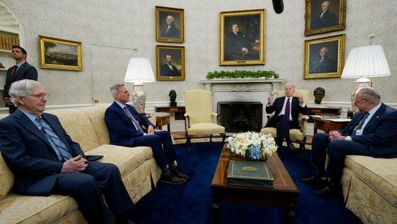 President Joe Biden, second from the right, meets with Senate Minority Leader Mitch McConnell, left, to discuss the debt limit in the Oval Office of the White House, on May 9, in Washington. Recently, McConnell claimed that impeaching President Biden would be “not good for the country."