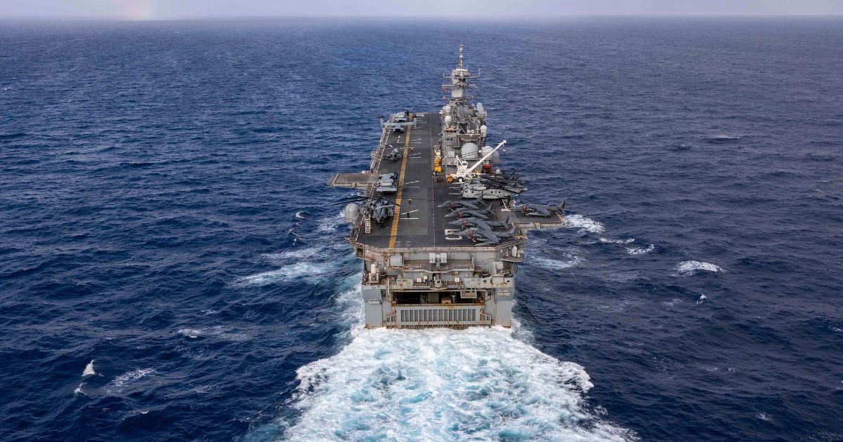 In this photo from the U.S. Navy, the Wasp-class amphibious assault ship USS Bataan travels through the Atlantic Ocean on July 20.