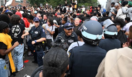 New York City police respond to a riot Friday after a "giveaway" event hosted by a popular Twitch live streamer in Union Square drew a crowd that turned violent.