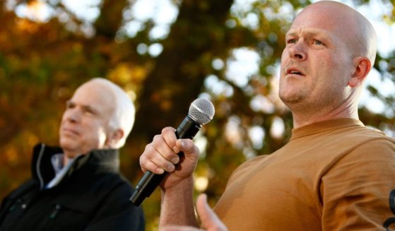 Then-Republican presidential nominee Sen. John McCain and Samuel "Joe the Plumber" Wurzelbacher address a campaign rally at Lorain County Community College Oct. 30, 2008, in Elyria, Ohio.