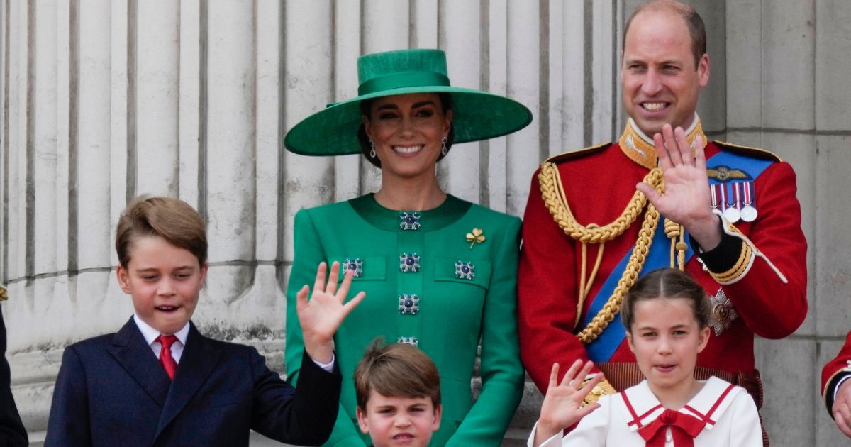Prince William, back right, Kate, Princess of Wales, back left, Princess Charlotte, bottom right, Prince Louis, bottom center, and Prince George, bottom left, greet the crowd from the balcony of Buckingham Palace after the Trooping The Colour parade in London, on June 17.