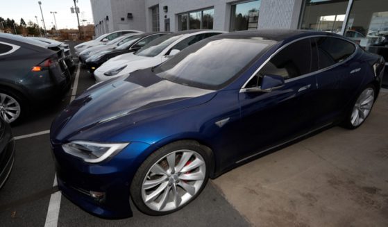 A 2020 Tesla Model S is pictured in a dealership in Littleton, Colorado, in a December 2020 file photo.