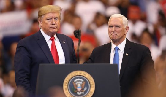 President Donald Trump and Vice President Mike Pence stand together during a homecoming campaign rally at the BB&T Center on Nov. 26, 2019, in Sunrise, Florida.