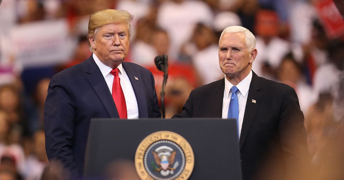 President Donald Trump and Vice President Mike Pence stand together during a homecoming campaign rally at the BB&T Center on Nov. 26, 2019, in Sunrise, Florida.