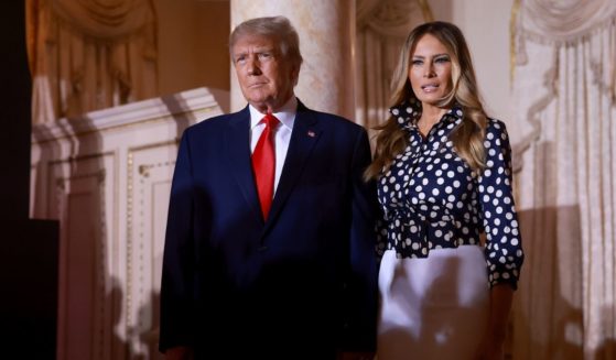 Former President Donald Trump and former first lady Melania Trump arrive for an event at his Mar-a-Lago home on Nov. 15, 2022, in Palm Beach, Florida.