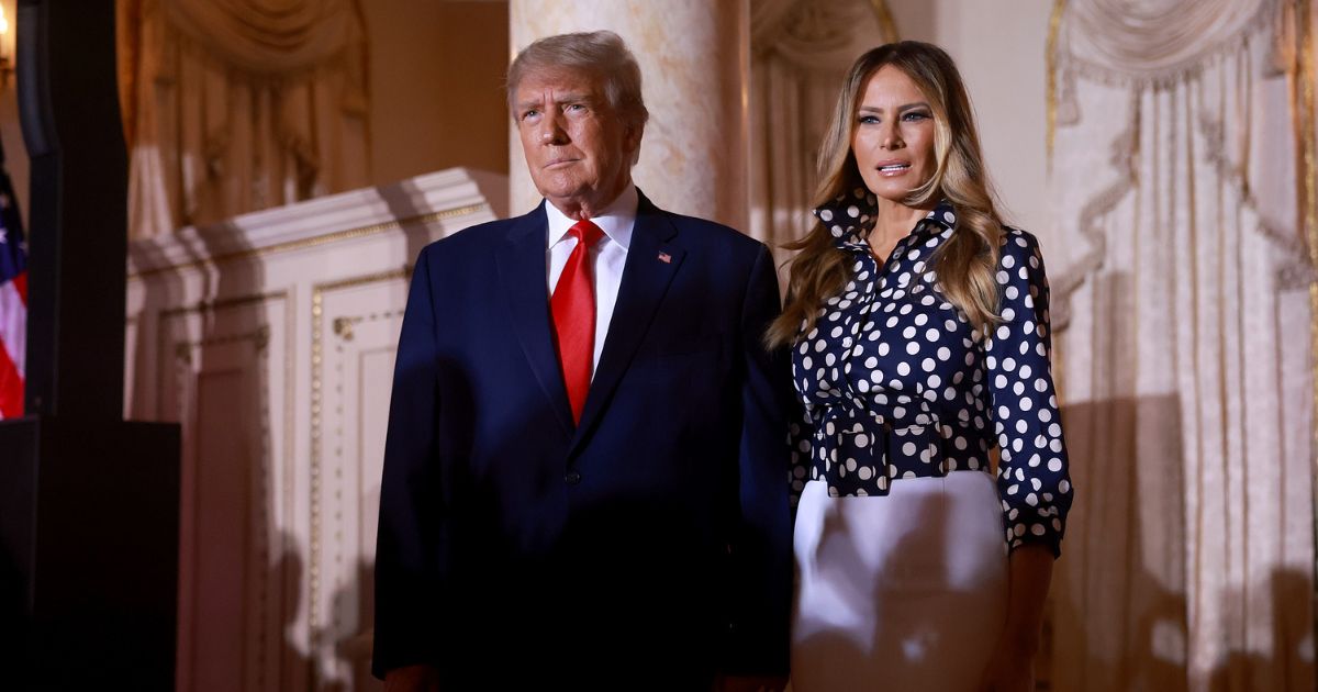 Former President Donald Trump and former first lady Melania Trump arrive for an event at his Mar-a-Lago home on Nov. 15, 2022, in Palm Beach, Florida.