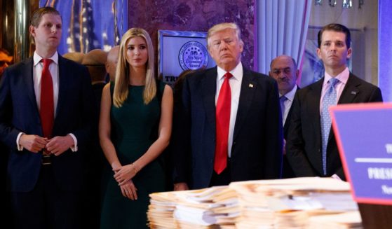 Then President-elect Donald Trump, accompanied by his family, arrives at a news conference in the lobby of Trump Tower in New York, on Jan. 11, 2017.