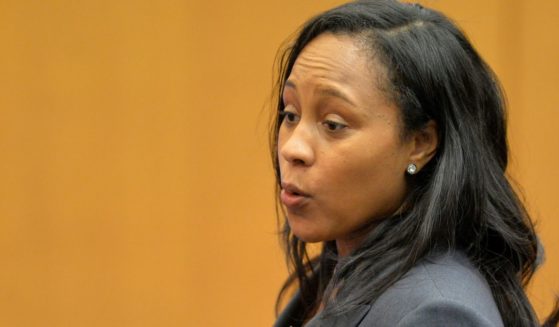 Fulton ADA Fani Willis makes the opening statement for the prosecution in a case against 12 former Atlanta Public Schools educators and administrators, in Atlanta, Monday, Sept. 29, 2014, in Fulton County Superior Court.