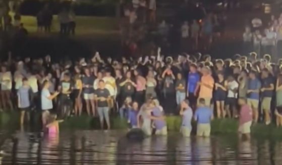 On Sept. 12, around 200 students at Auburn University in Auburn, Alabama, were baptized following an event on campus. Now, Alabama Gov. Kay Ivey is standing up for the religious display after an anti-religious organization condemned the event.