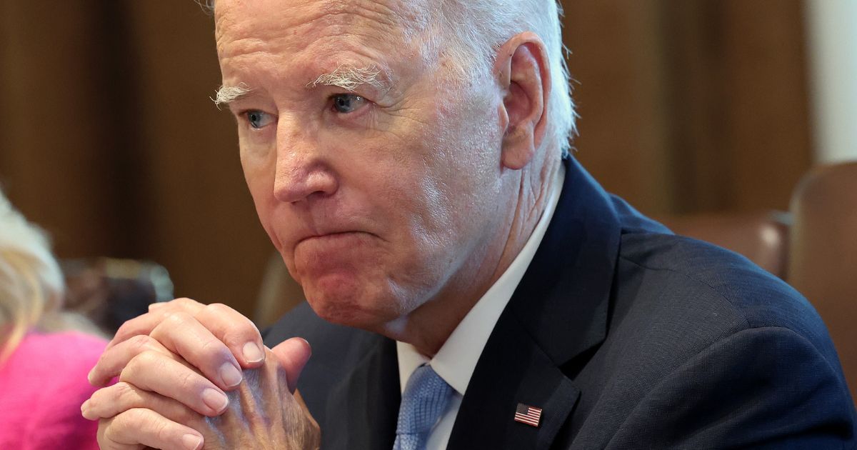 President Joe Biden listens to shouted questions regarding his impeachment during a meeting at the White House in Washington on Wednesday.
